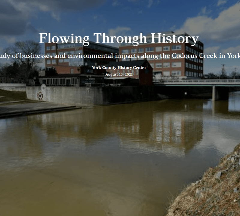 Photo of Codorus Creek with Commerce Center building in background
