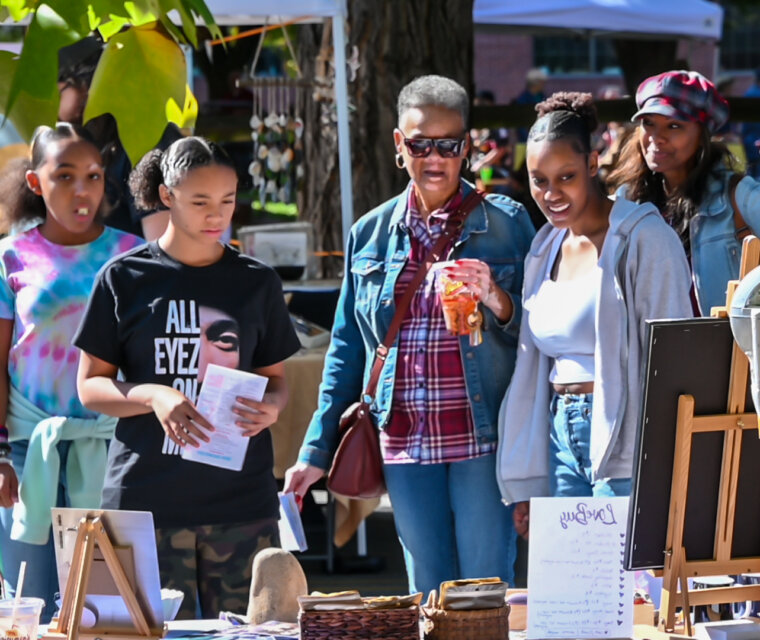 family browsing at Oyster Festival