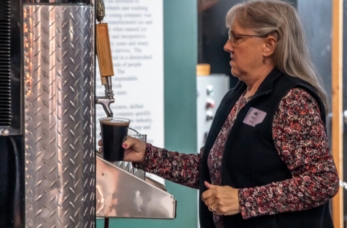 woman serving beer at Oyster Festival